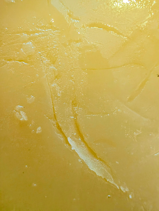 Baby Gouda Natural cheese texture close-up