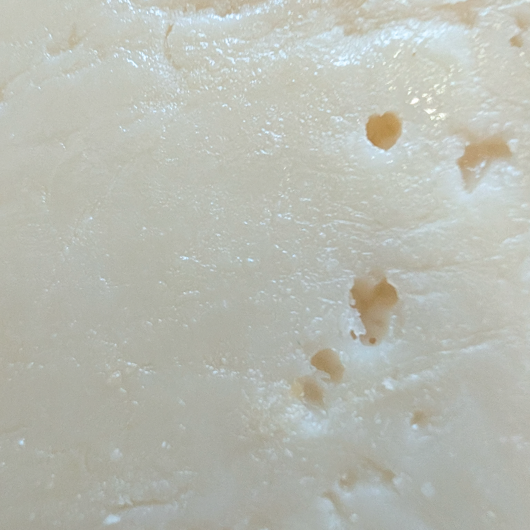 Dutch Goat Natural cheese texture close-up