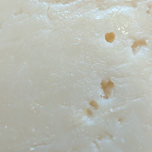 Dutch Goat Natural cheese texture close-up