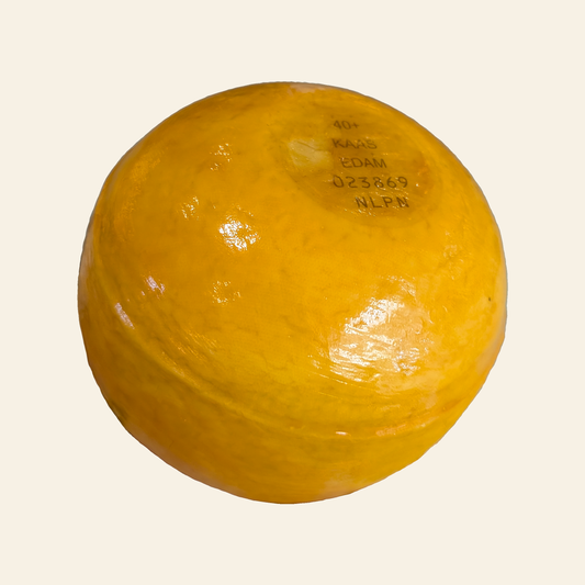Olga's Cheese Old Edam on a clean cream studio background